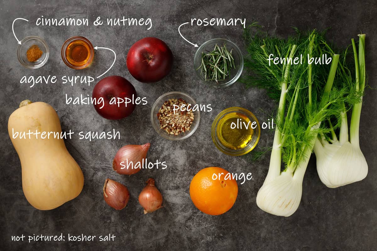 Ingredients for this butternut squash and apple tian include butternut squash, apples, fennel, shallots, an orange, fresh rosemary, pecans, cinnamon and nutmeg, olive oil, and kosher salt.