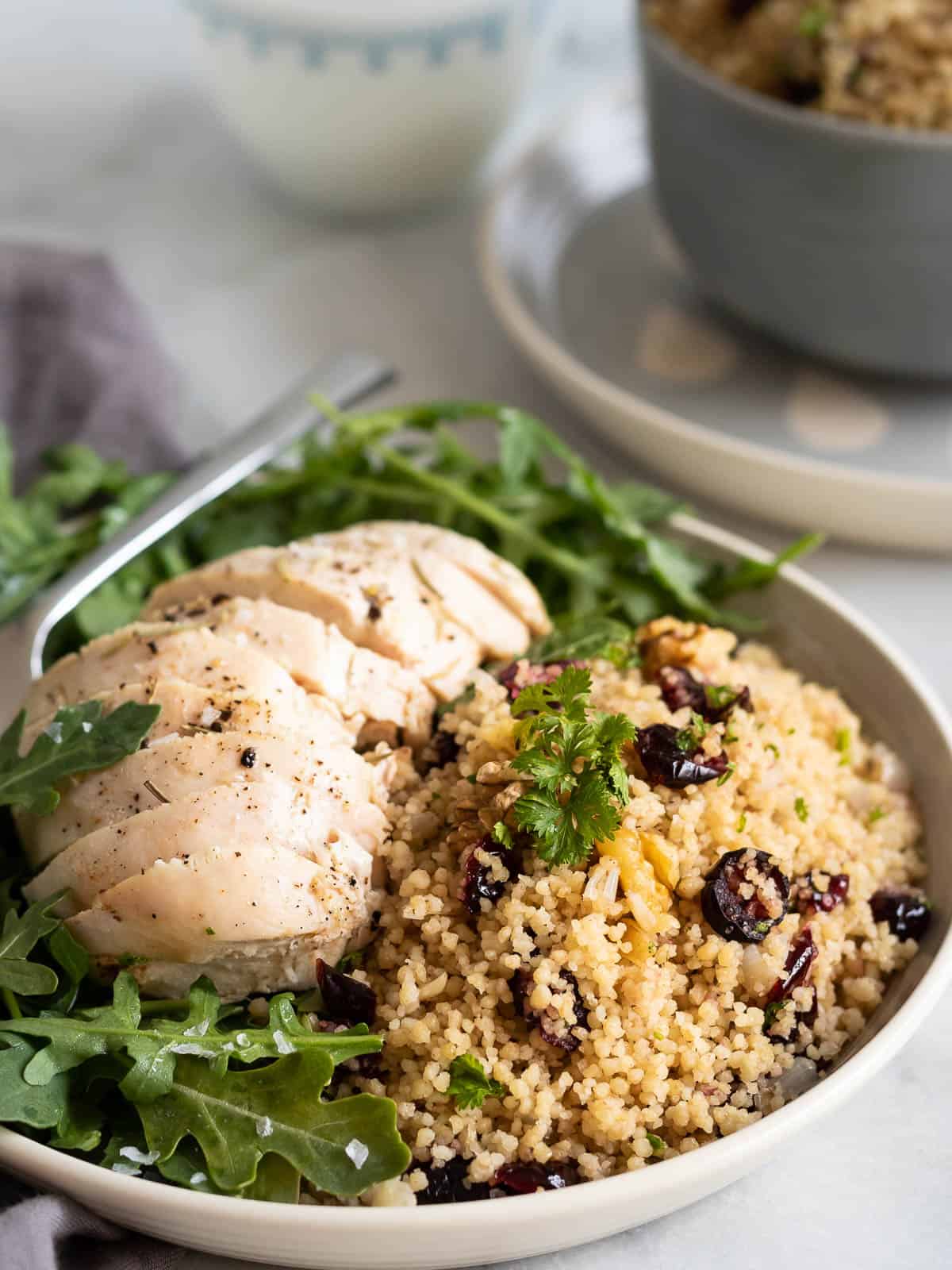 grilled chicken served with whole wheat cranberry walnut couscous