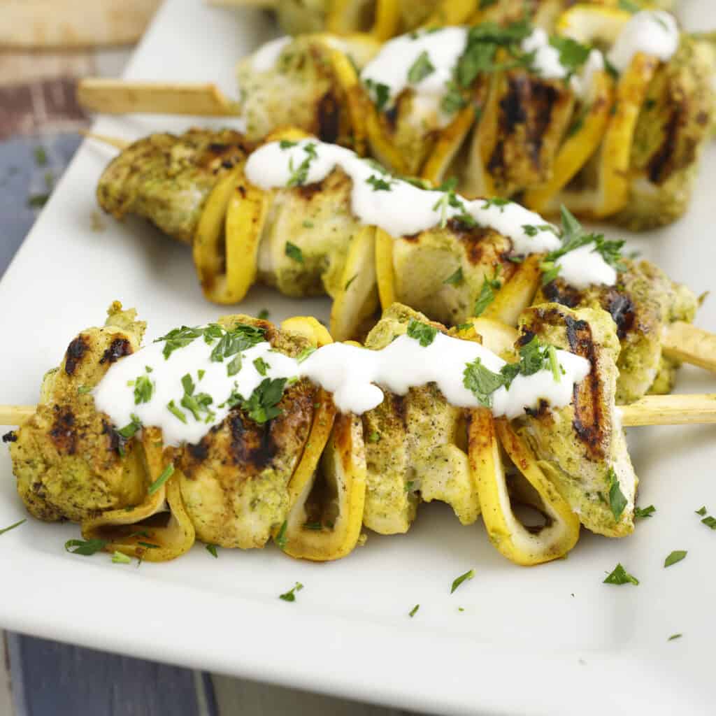 grilled halibut skewers on a plate