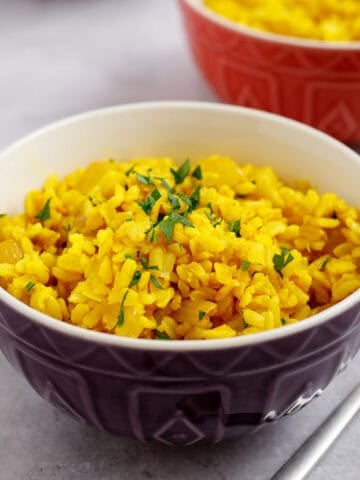 Mediterranean yellow rice for shawarma in a bowl. Made with brown basmati rice.