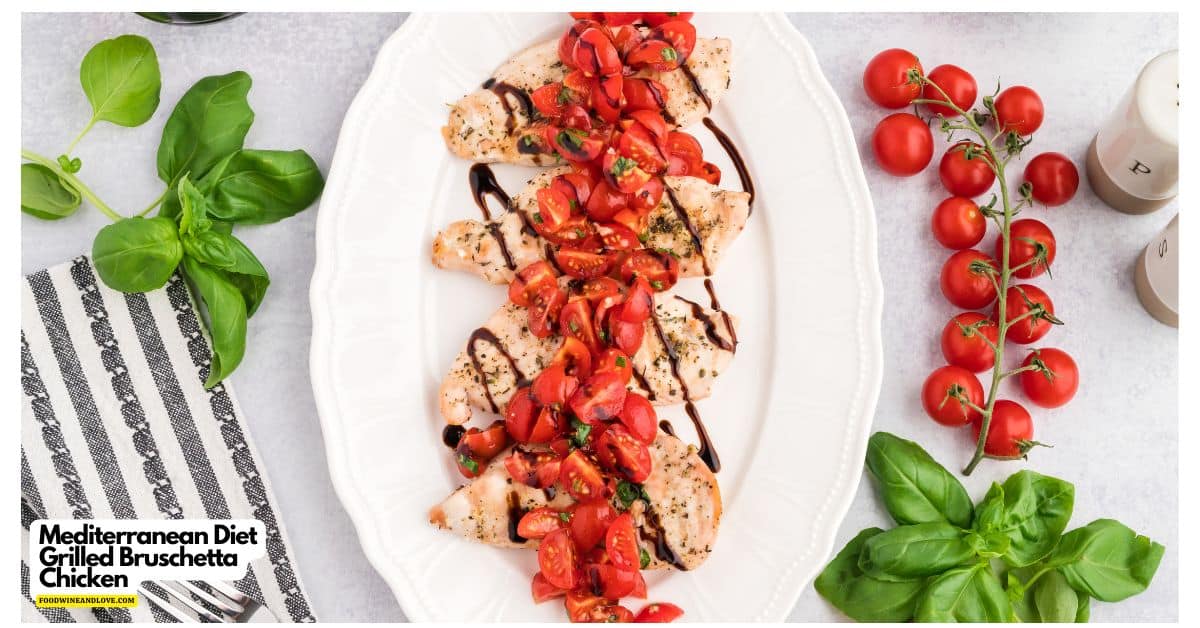 grilled chicken on a platter topped with tomato bruschetta