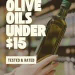 pinterest pin with an image of a woman holding a bottle of olive oil in a grocery store. Overlay says "best olive oils under $15" Tested and Rated.