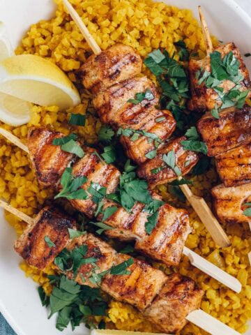 grilled salmon kebabs with shawarma spice and golden cauliflower rice