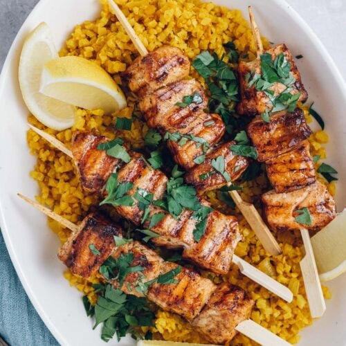 grilled salmon kebabs with shawarma spice and golden cauliflower rice