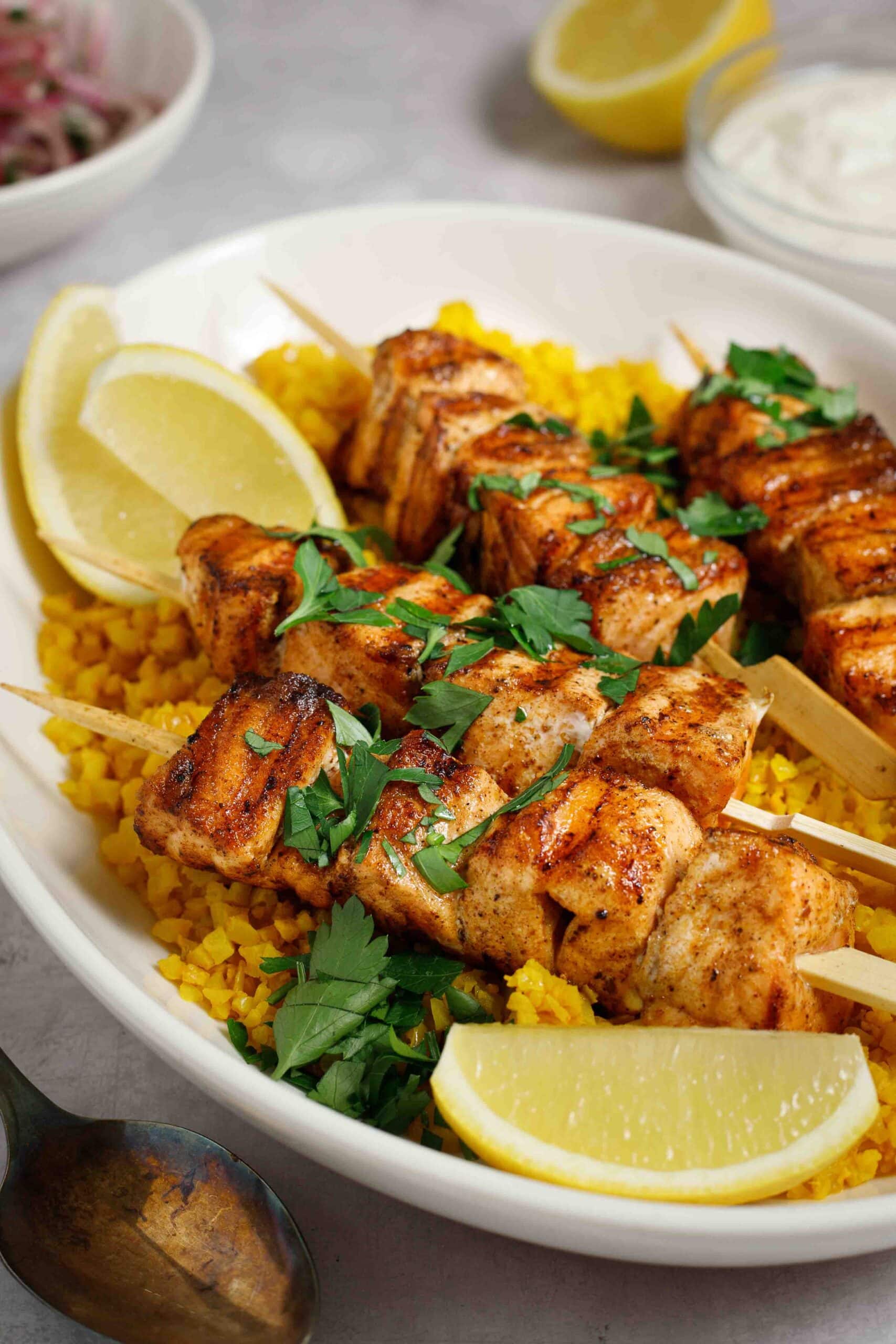 shawarma grilled salmon kebabs on a plate.