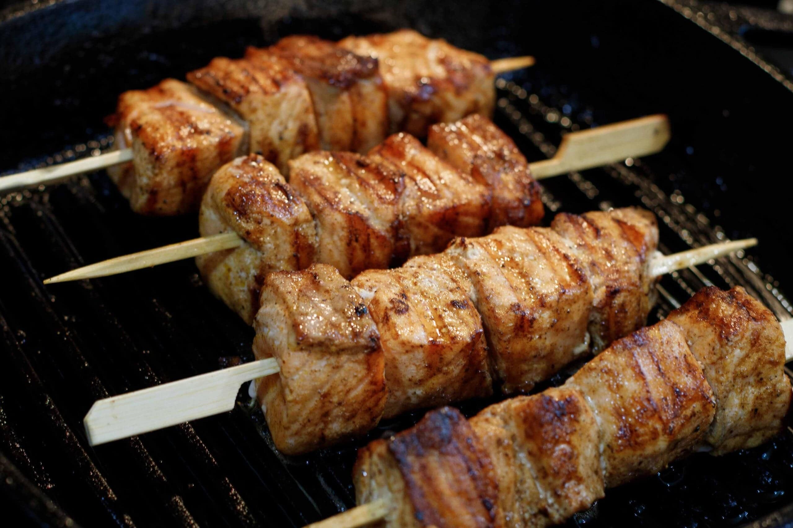 shawarma salmon kebabs on a grill pan